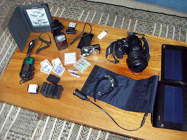 Cameras, batteries, chargers, adaptors, memory cards, phone, GPS, solar panel, Kindle - do we really need it all when we travel?