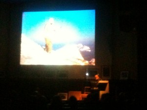 Kurt Diemberger shows a photo of Hermann Buhl on the summit of Broad Peak during its first ascent