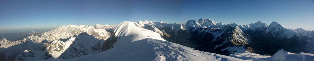 Everest (centre, far horizon) and Makalu (right, far horizon) from the summit of Mera Peak (Photo: Huw Davies)