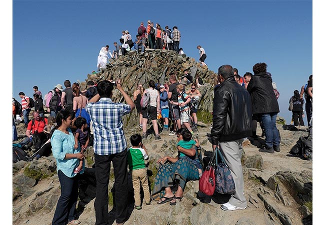 Queues on the summit of Snowdon on a busy August bank holiday weekend (Photo: Ray Wood)