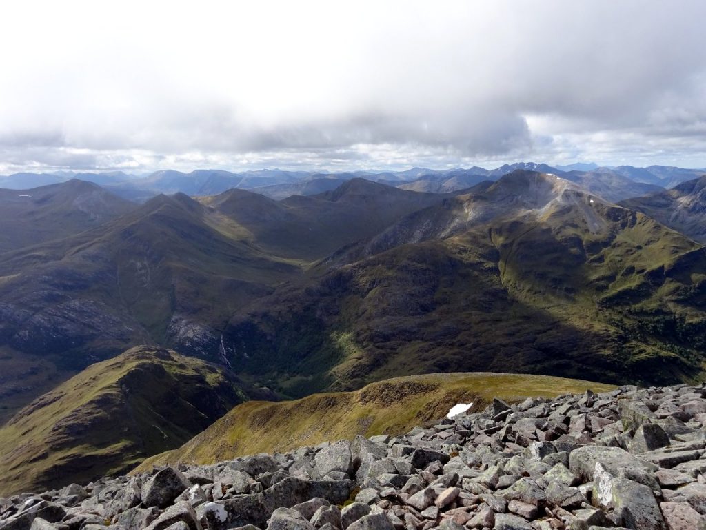 The Ring of Steall from the CMD Arete. Sgurr a Mhaim is the grey-topped peak towards the right, and the top of the waterfall can be seen below left.