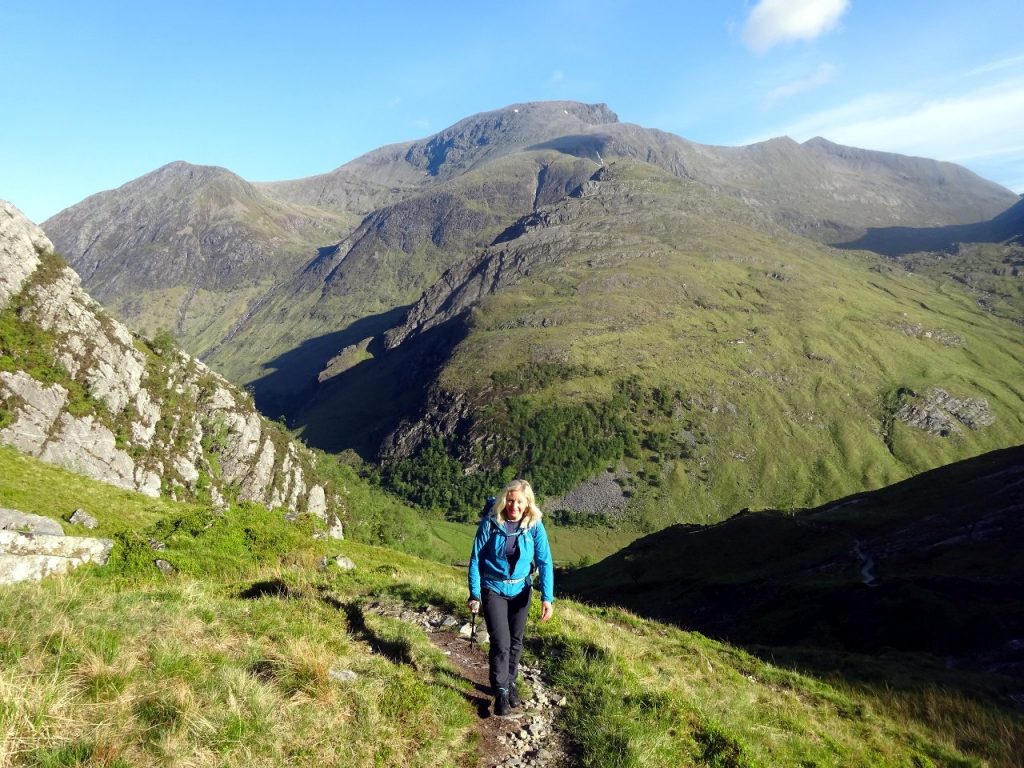 Edita makes her way up An Gearanach, with Ben Nevis rising behind