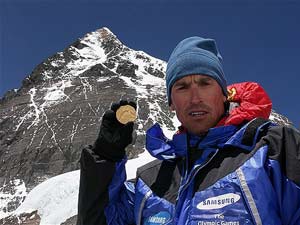 Kenton Cool looking rather like Alan Partridge with his Olympic medal (Photo: Kenton Cool / Samsung)